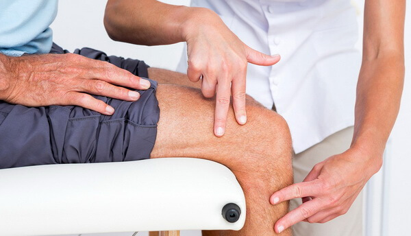 Причины артрита колена